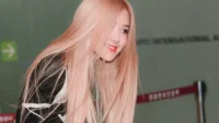 K-Pop-Idole rocken pfirsichfarbenes Flaumhaar, noch bevor Pantone es zur Farbe des Jahres 2024 machte