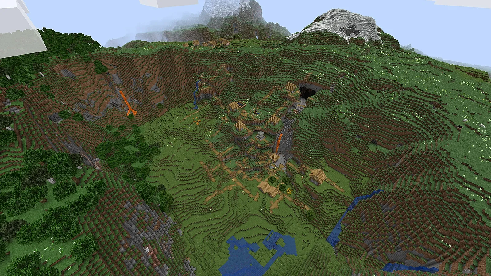 Un village de plaine niché dans une vallée dans Minecraft