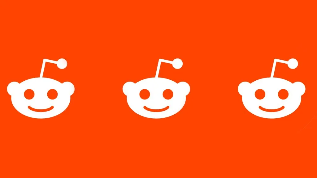 logotipo do reddit três vezes em fundo laranja