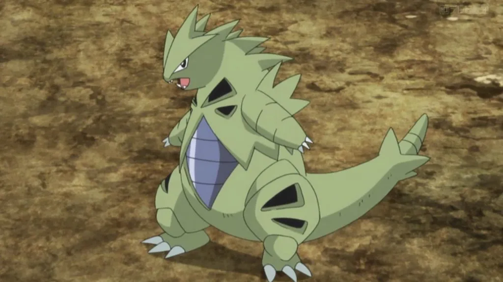 Captura de pantalla de Tyranitar del anime Pokémon.