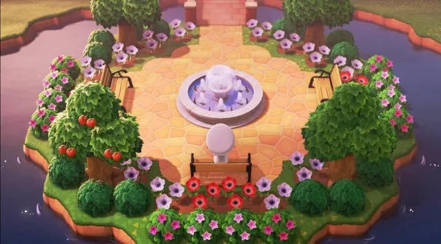 Uma imagem de um layout de ilha de parque em novos horizontes de Animal Crossing com árvores frutíferas, flores, um lago e uma fonte