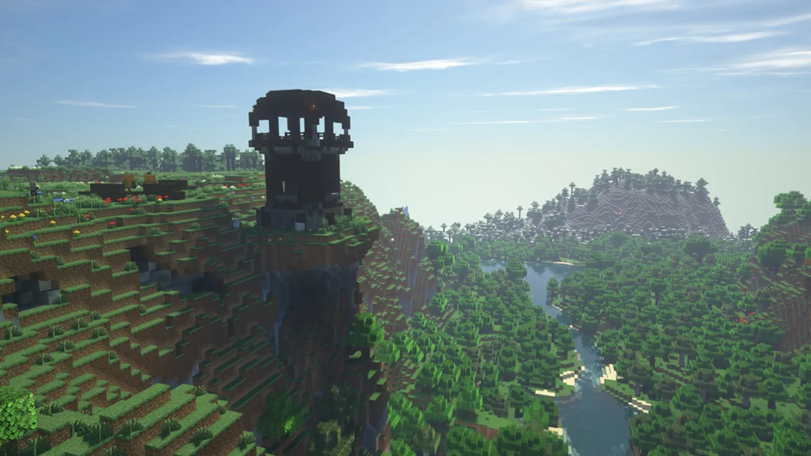 Ein Plünderer-Außenposten mit Blick auf eine Klippe in Minecraft