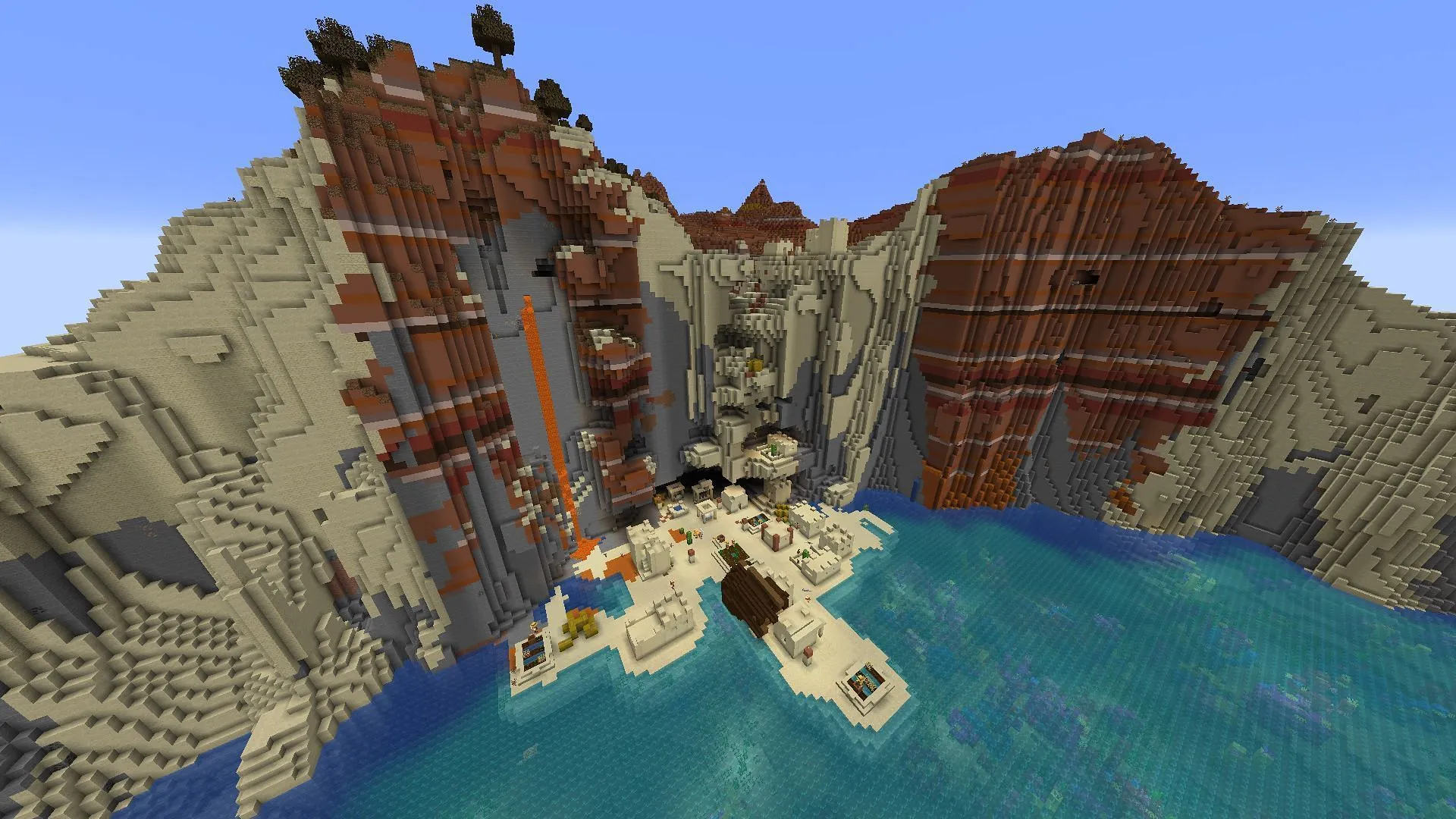 This Minecraft seed features a lovely village facing a vast coral ocean (Image via Mojang)