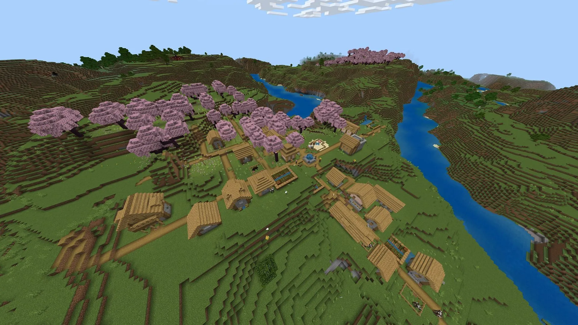 Les cerisiers de cette graine Minecraft constituent un lieu de départ pittoresque (Image via Mojang)