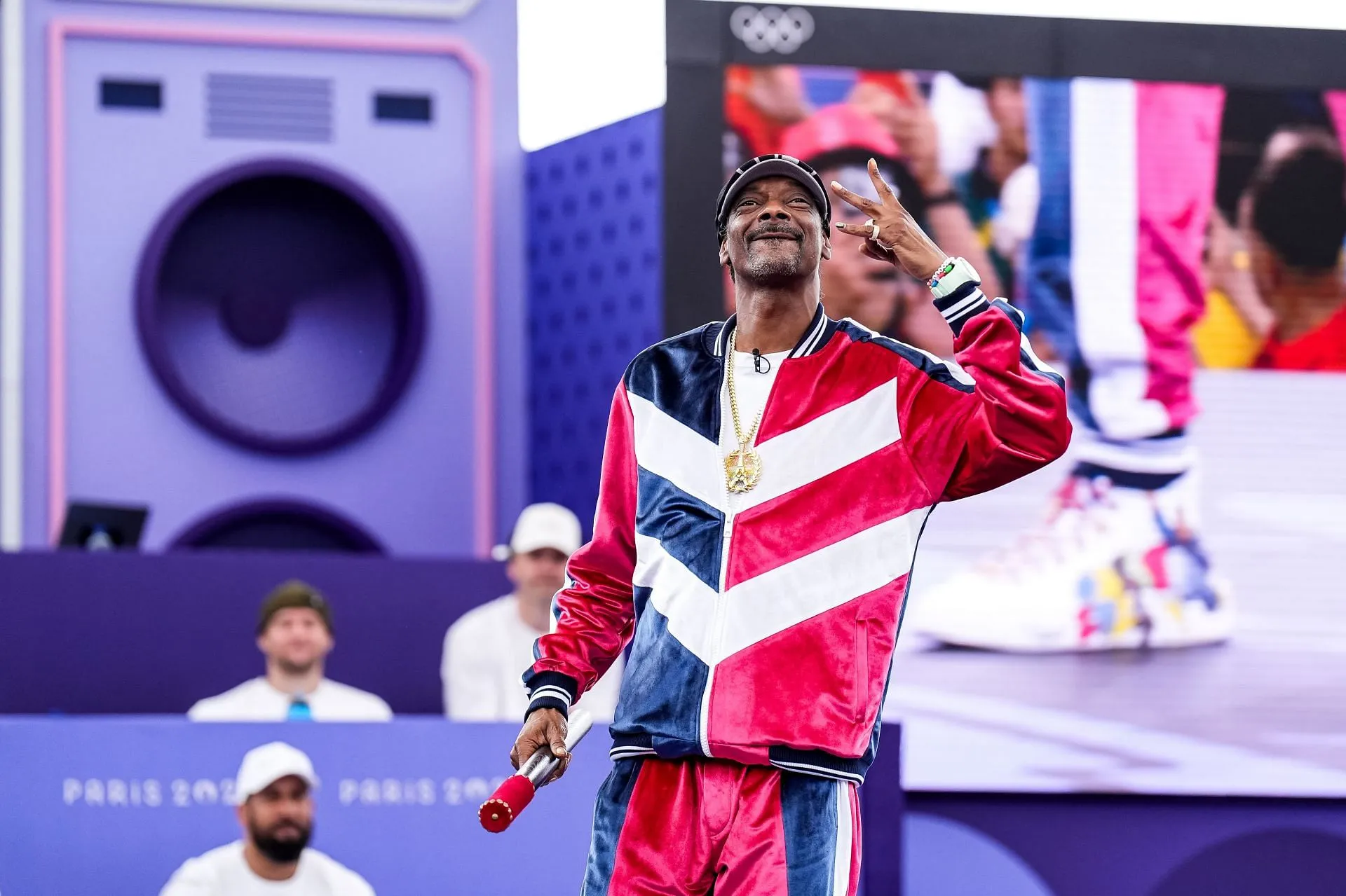 Snoop Dogg of The Voice season 26 performs at the Coup de Baton ceremony at the Olympic Games Paris 2024