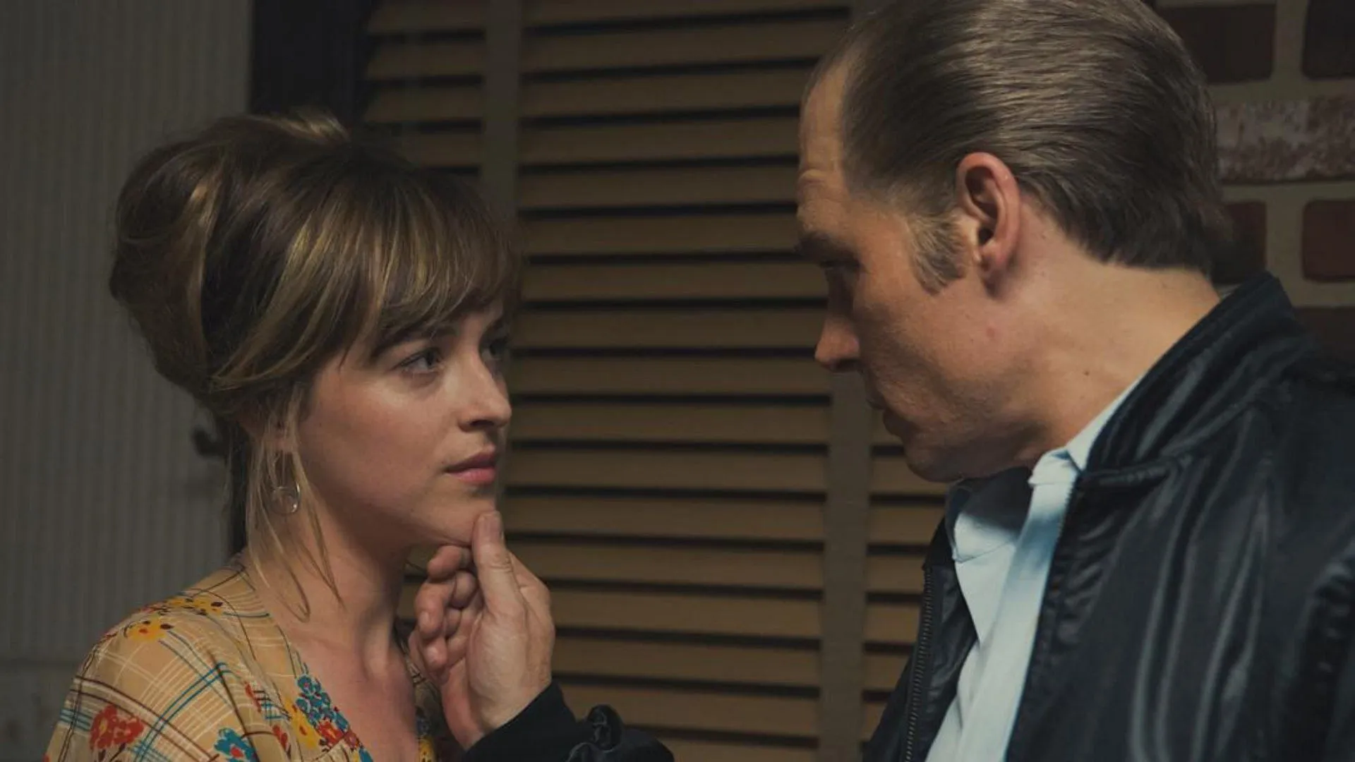 Johnny Depp and Dakota Johnson in Black Mass