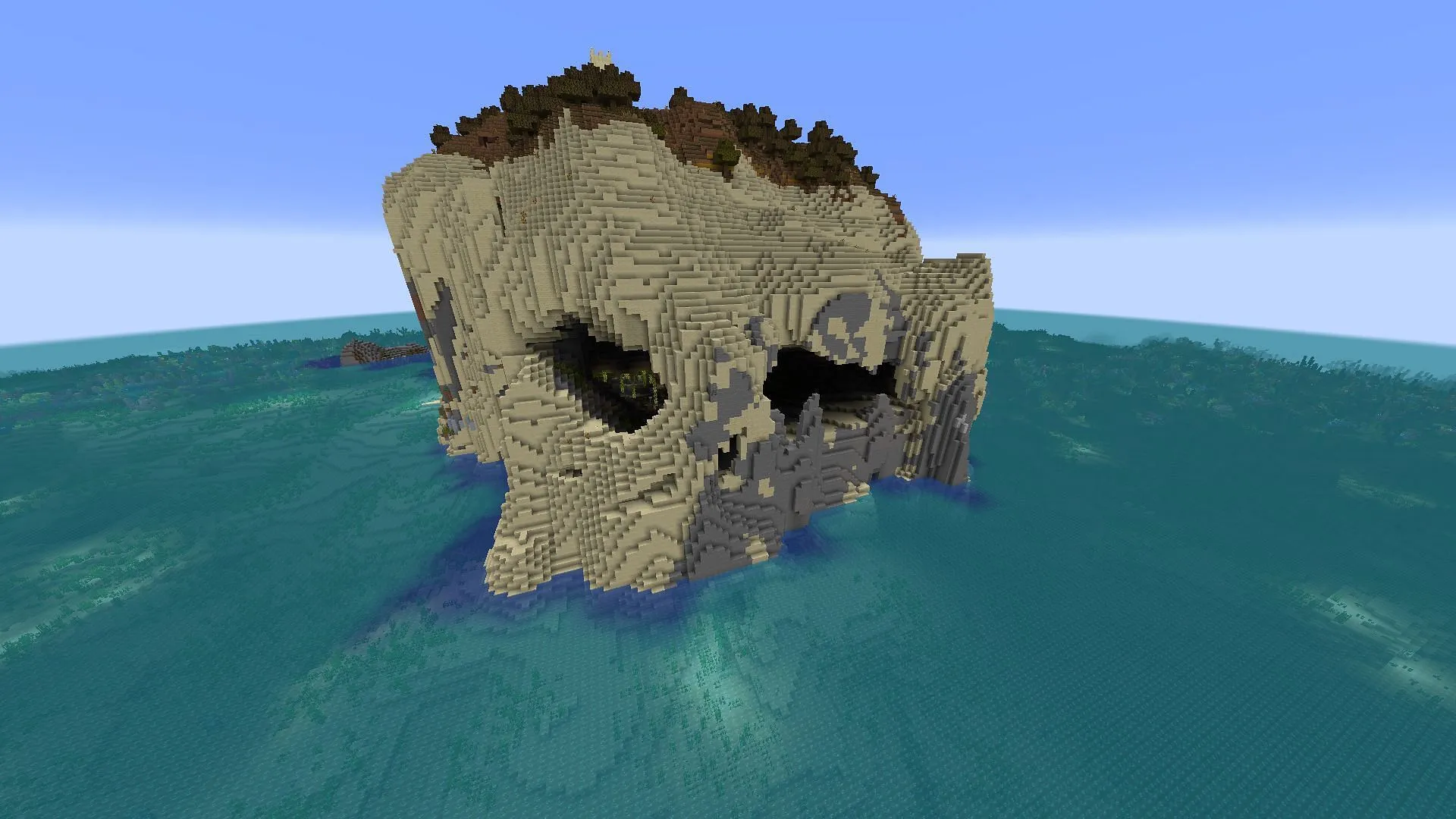 Un édifice en forme de crâne peut être trouvé sur l'île d'apparition de cette graine Minecraft (Image via u/DPS3/Reddit)