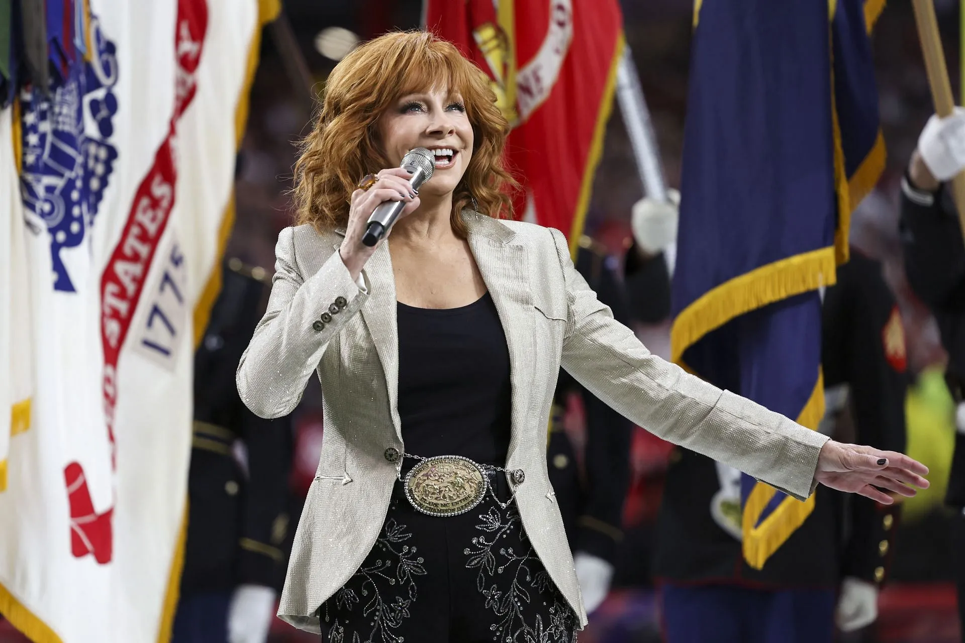 Reba McEntire of The Voice season 26 performs the national anthem Super Bowl LVIII - San Francisco 49ers v Kansas City Chiefs