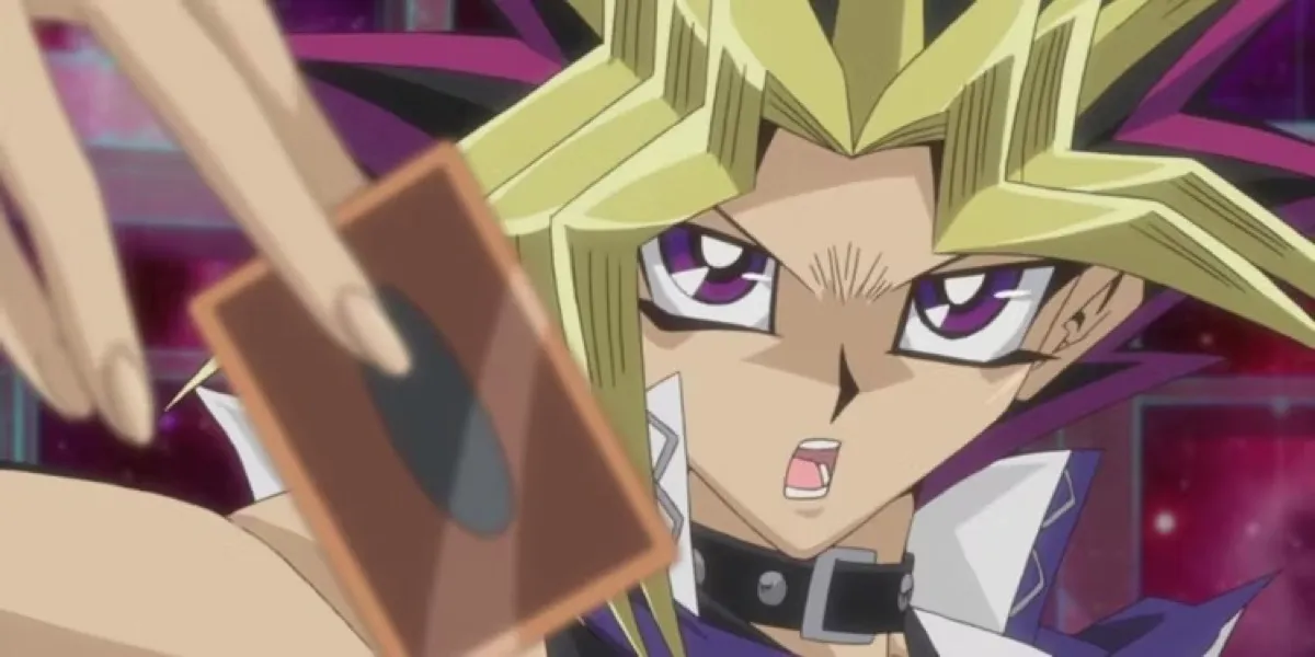 Yugi draws a card in