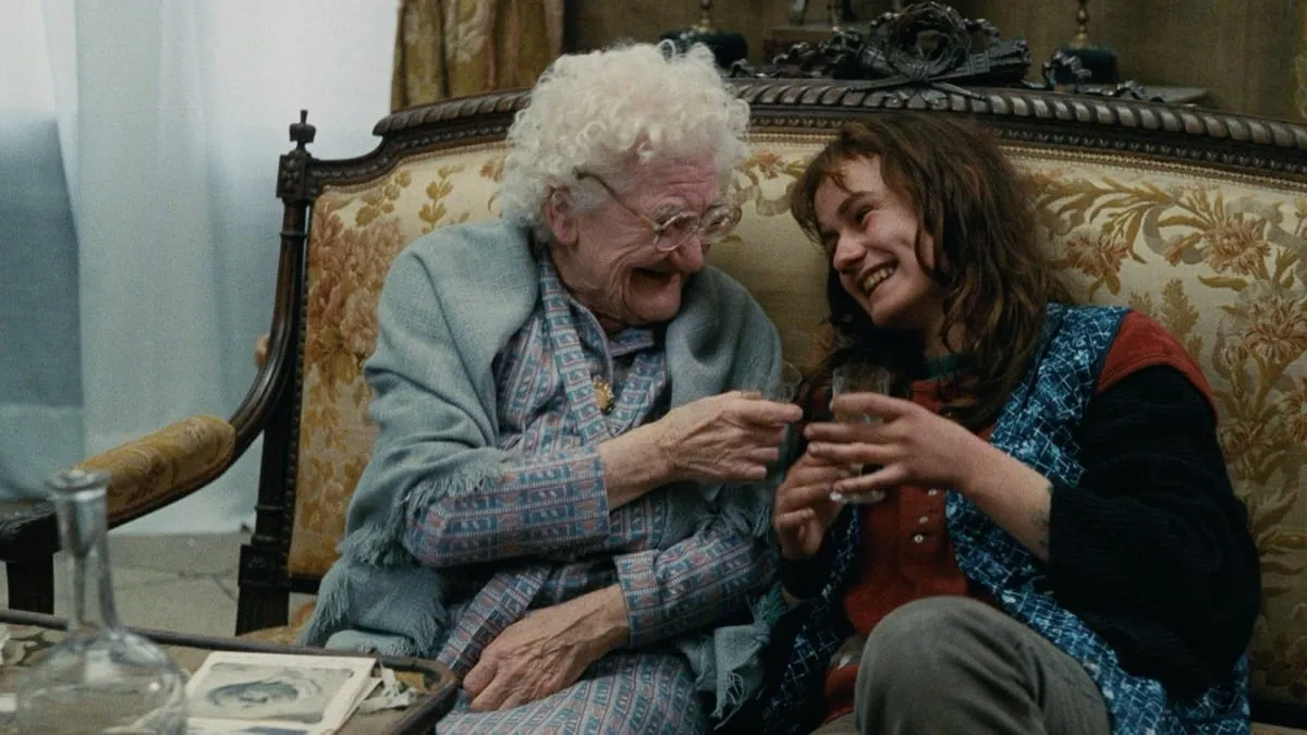 A young woman shares a laugh with an older woman in 'Vagabond'