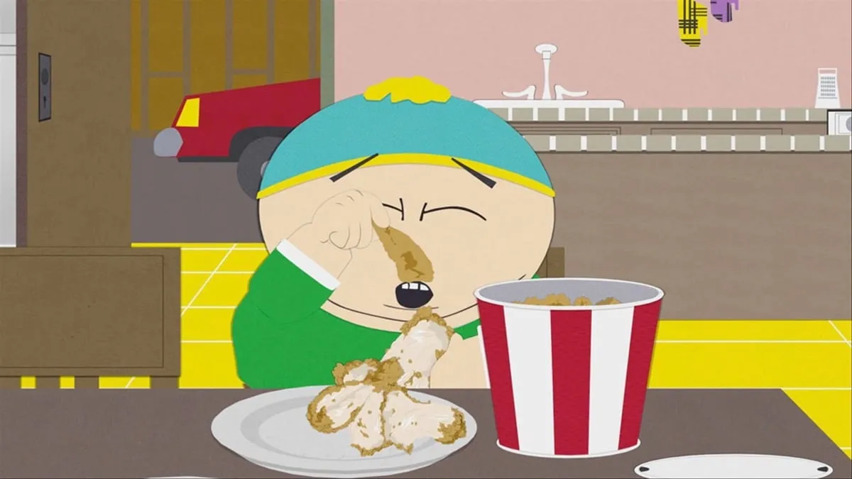 Cartman eats the skin off of KFC chicken in