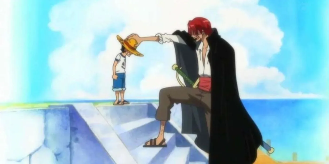 Shanks überreicht Ruffy seinen Strohhut, nachdem er ihm in One Piece das Leben gerettet hat