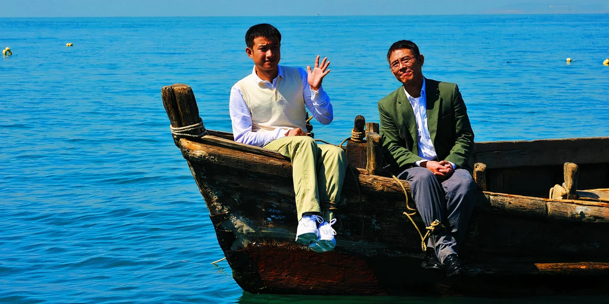 10 Best Jet Li Movies, Ranked A Father and his son sit on a boat