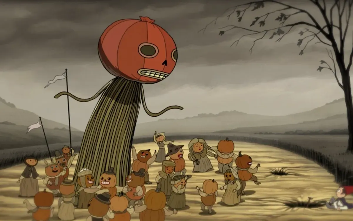 A group of villagers, each with a pumpkin for a head, dance around a giant pumpkin-headed figure. The sky is grey, the grass is brown, and a nearby tree is skeletal.