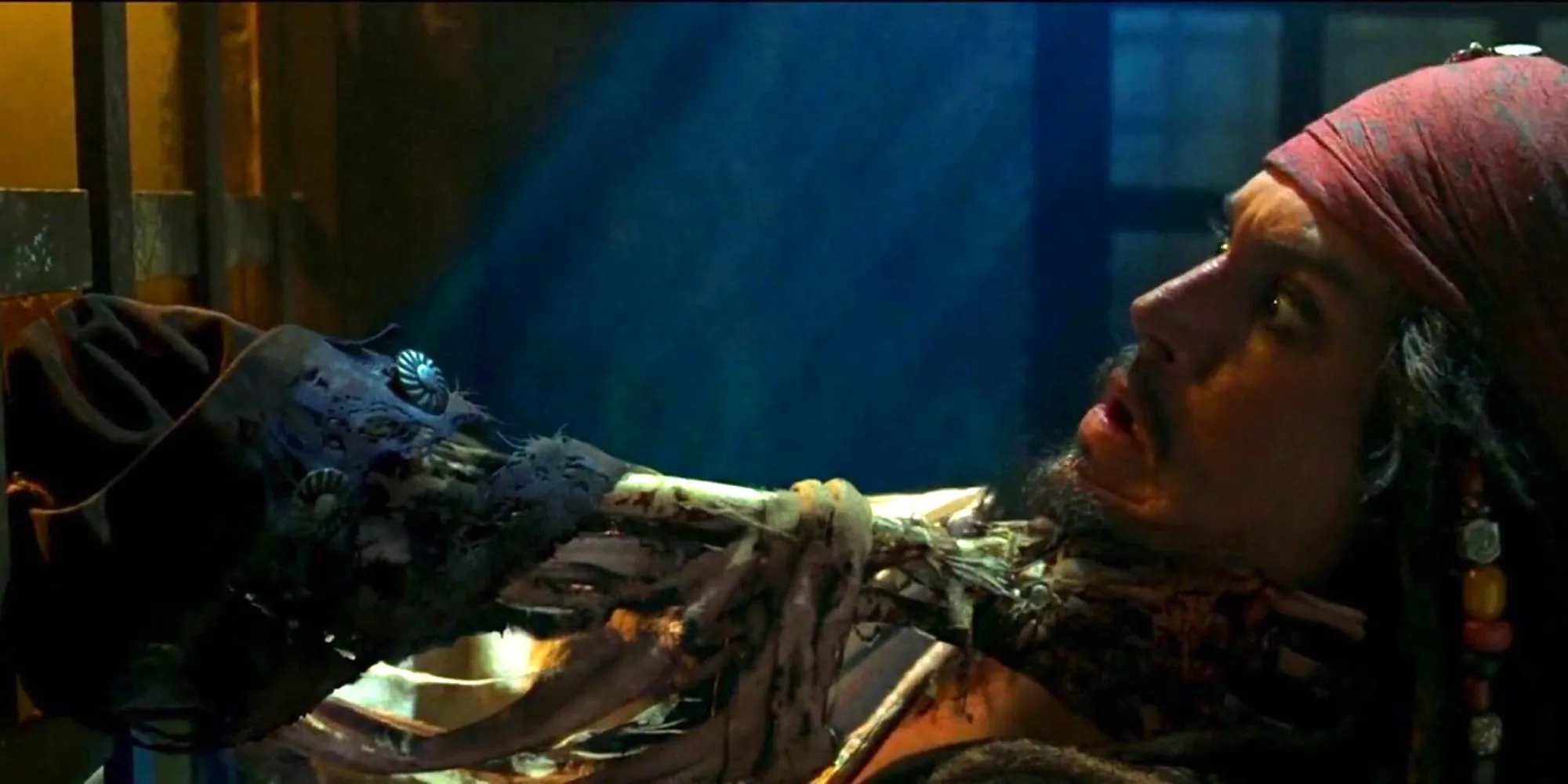 Skeleton arm grabbing Jack Sparrow in Pirates Of The Caribbean: The Curse Of The Black Pearl