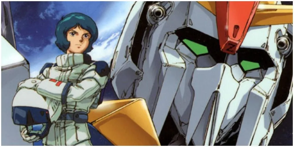 Un hombre posando junto a su gundam.