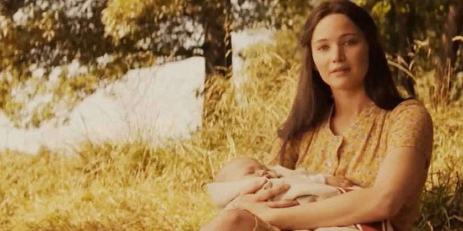 Katniss holding her baby in Mockingjay: Part 2.