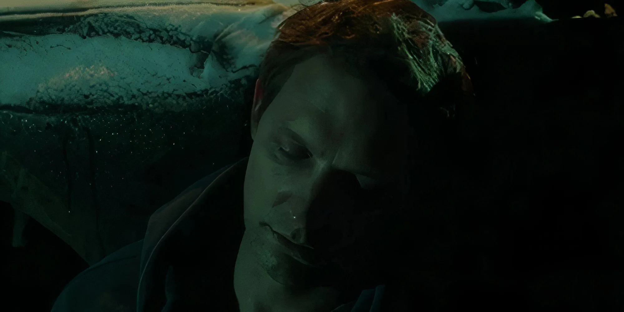 Michael Cassidy unconscious as Dr. Ethan Stone in Resident Alien