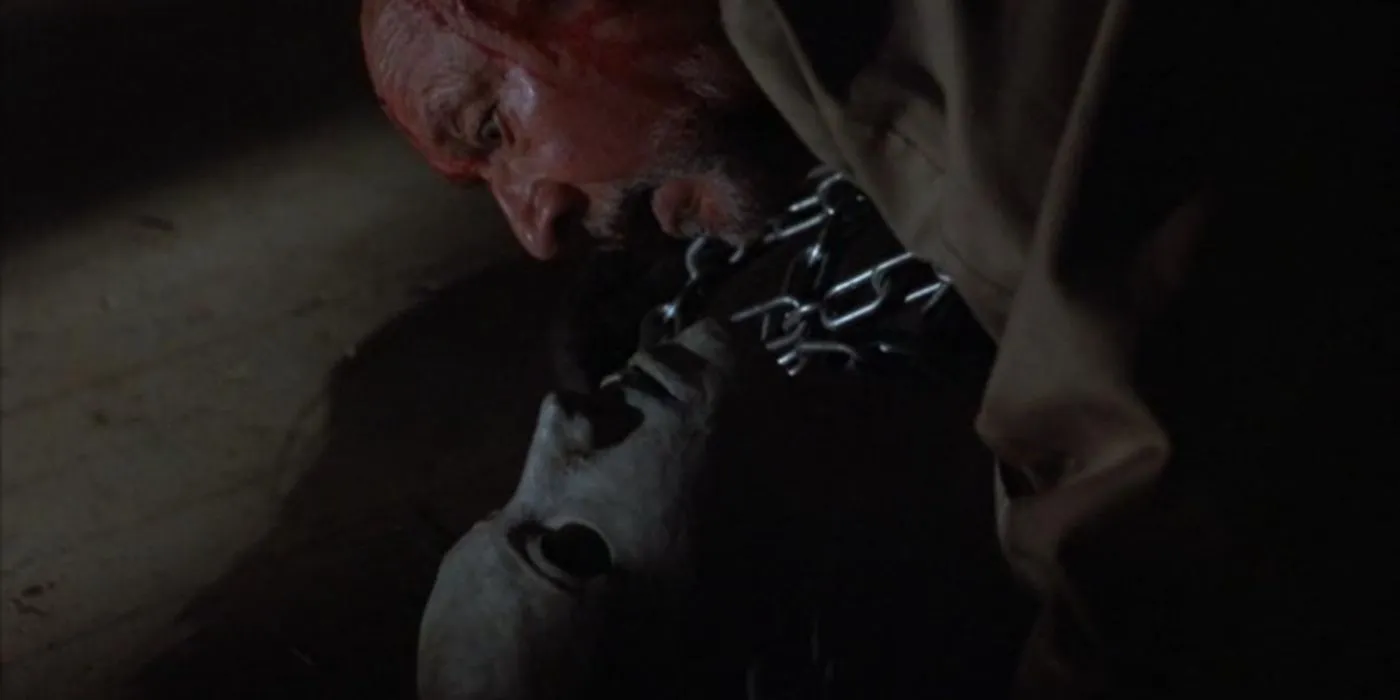 Dr. Loomis sofre um derrame em cima do corpo de Michael Myers em Halloween 5: A Vingança de Michael Myers