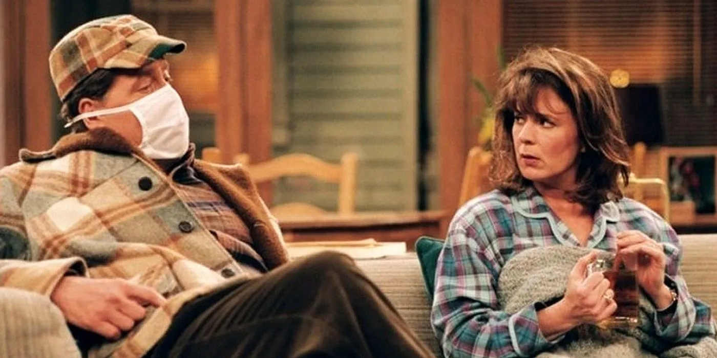 Wilson (Earl Hindman) wearing a face mask while talking to Jill (Patricia Richardson) in Home Improvement