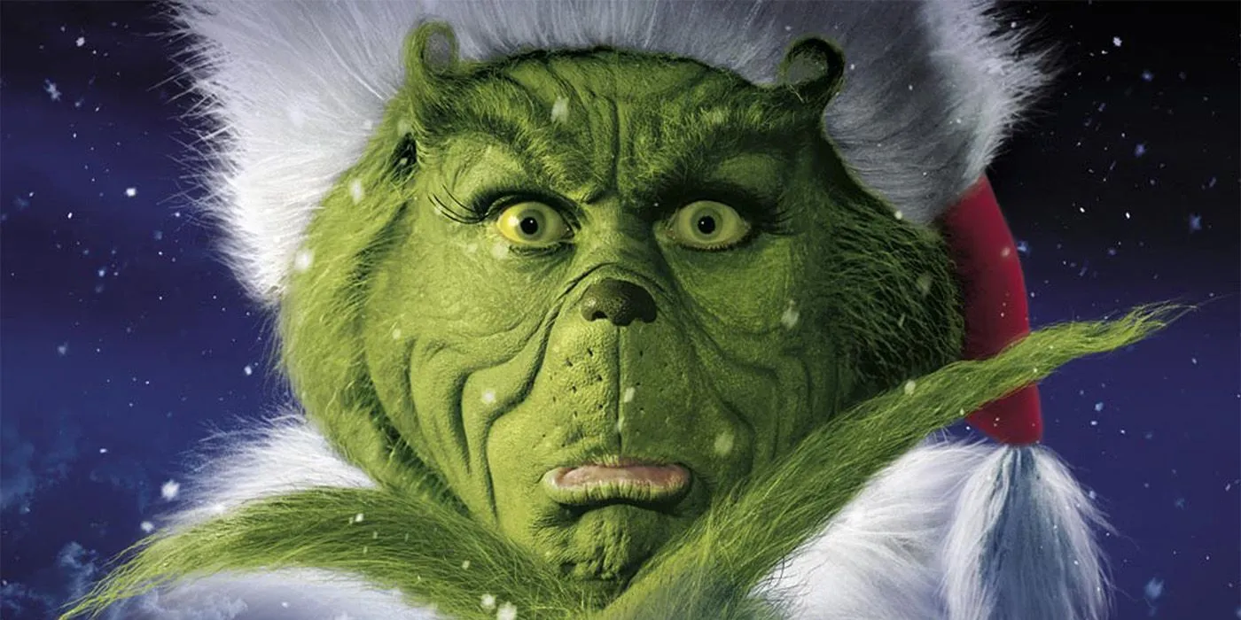 Jim Carrey posando como El Grinch