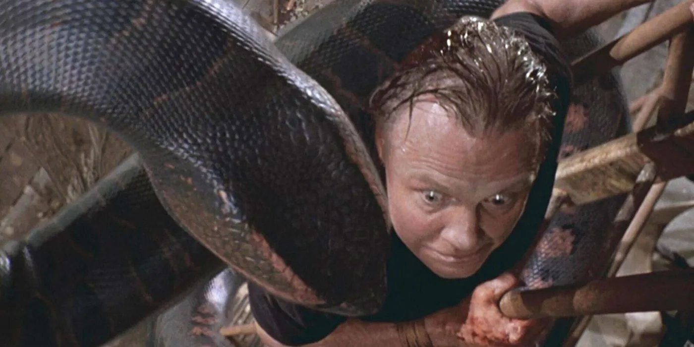 Jon Voight sorprendido por la serpiente en Anaconda