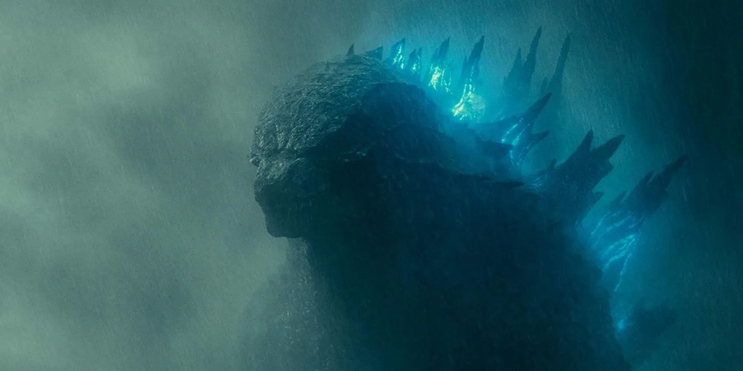 Godzilla em seus filmes recentes do MonsterVerse com espinhos brilhando em azul