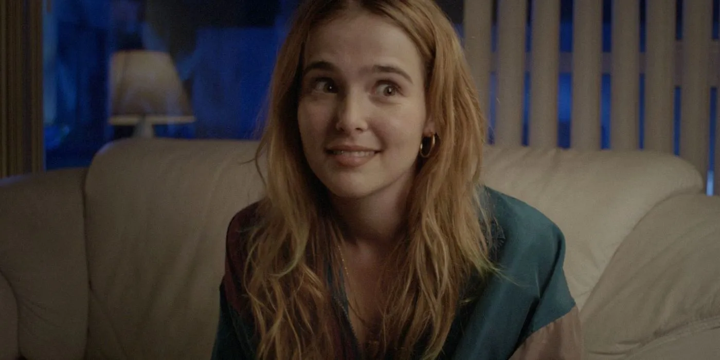 Zoey Deutch parecendo surpresa em Flower