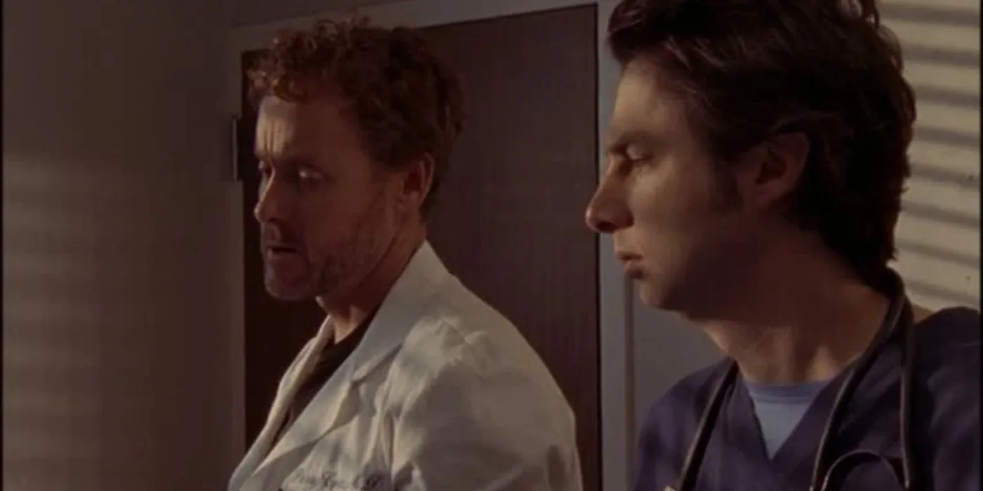 JD et le Dr Cox regardent tristement en bas dans Scrubs