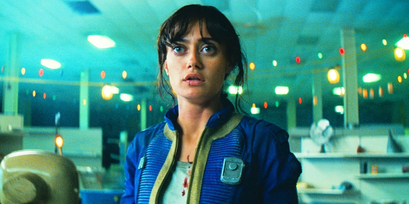 Ella Purnell as Lucy looking surprised