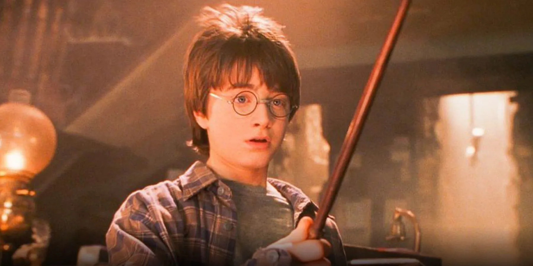 Harry Potter avec sa baguette