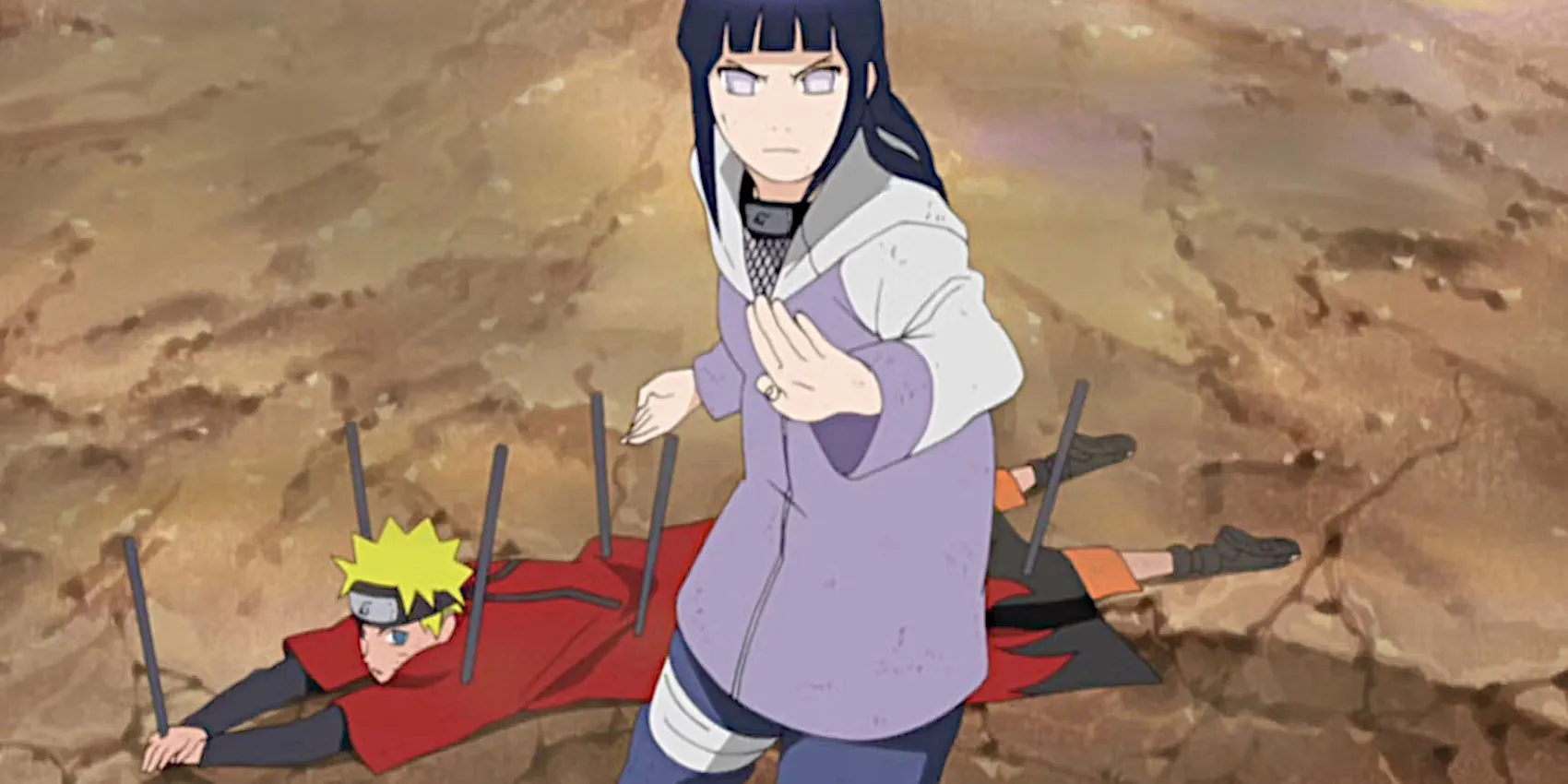 Hinata protège Naruto au combat