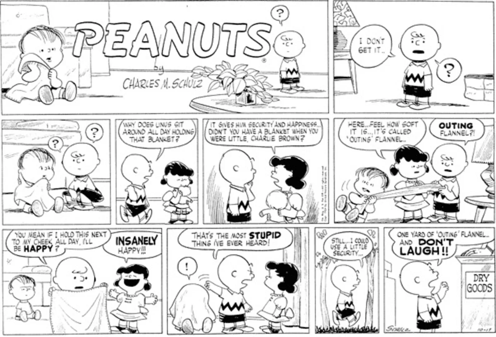 Lucy mostra la coperta di Linus a Charlie Brown.