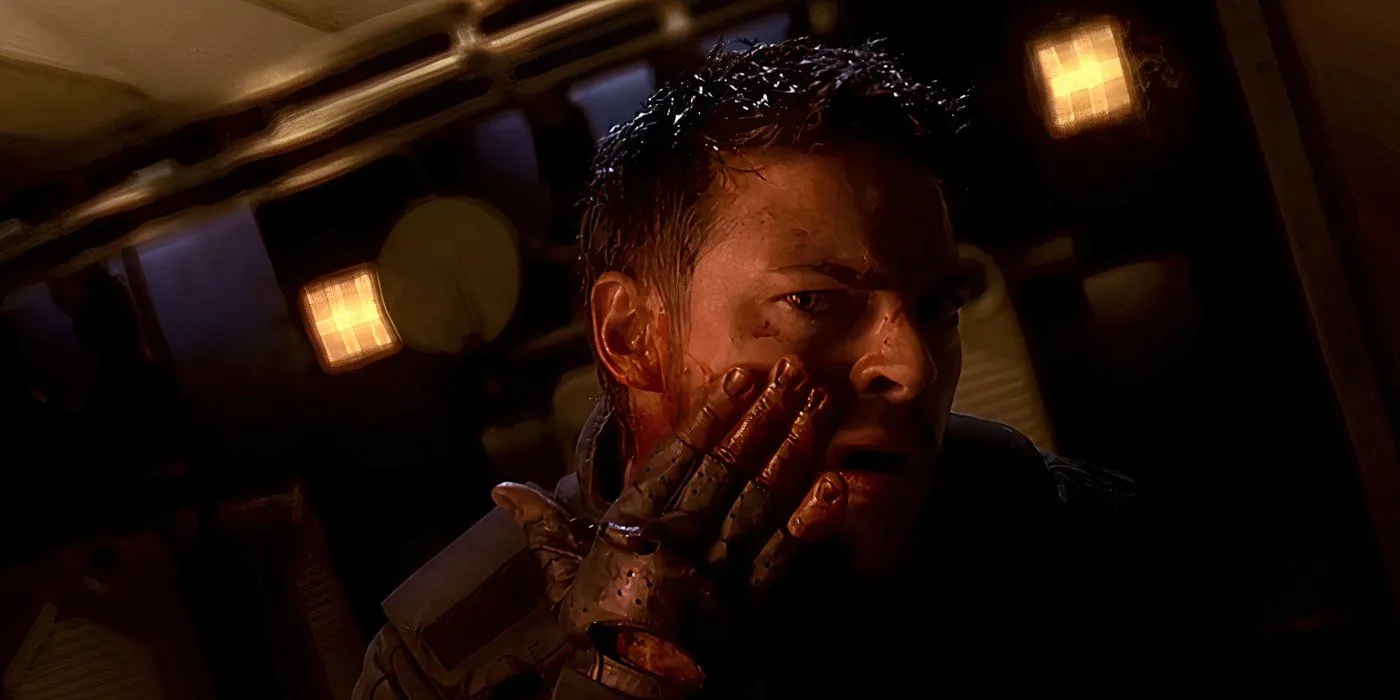 Karl Urban se regardant dans le miroir dans Doom