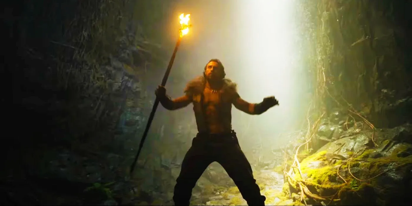 Kraven the Hunter with a flame in the SSU movie trailer