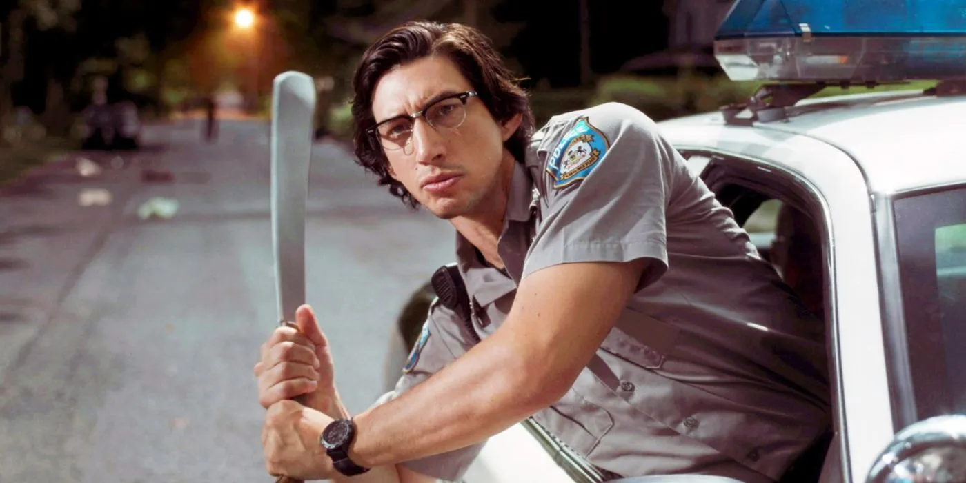 Adam Driver se penche par la fenêtre d'une voiture en tenant une batte de baseball dans The Dead Don't Die