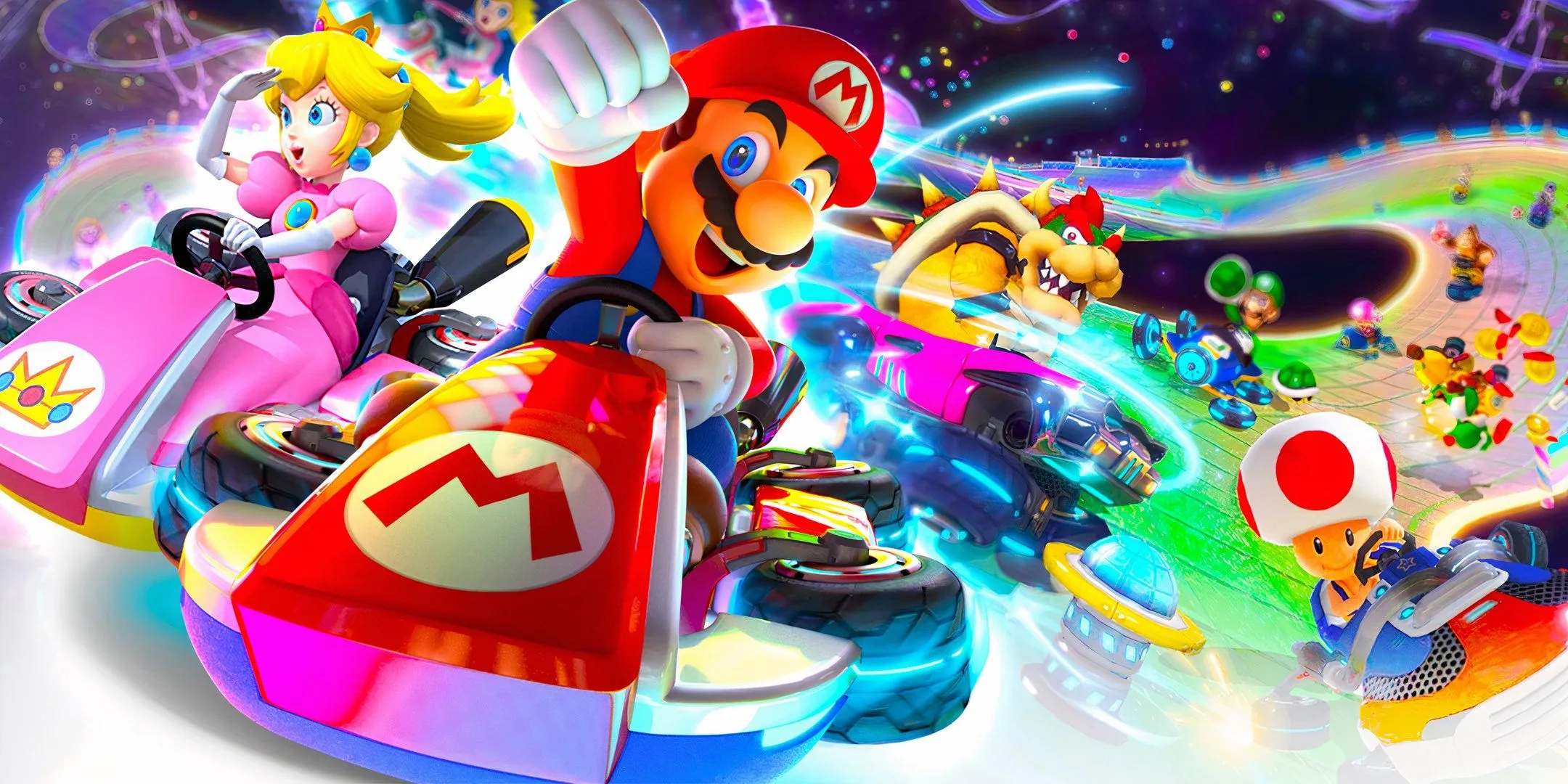 Mario, Peach et Bowser font la course avec des karts de Mario Kart 8.