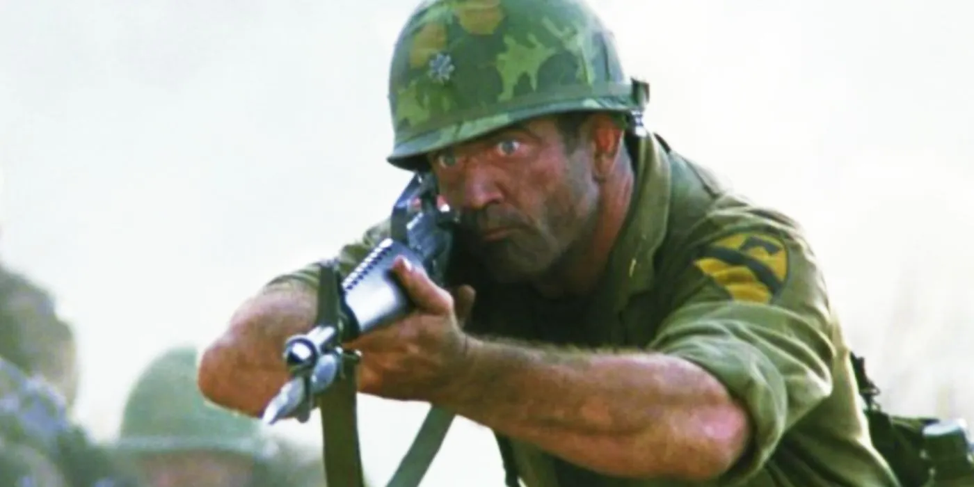 Mel Gibson holding a rifle as Hal Moore in We Were Soldiers