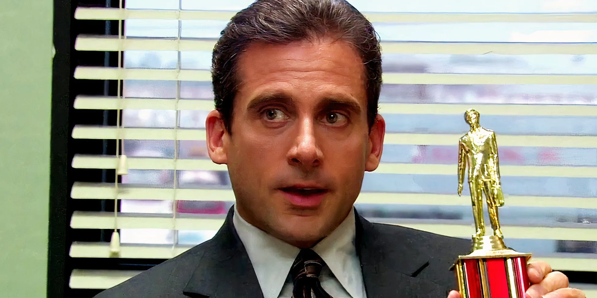 Michael Scott with Dundie award