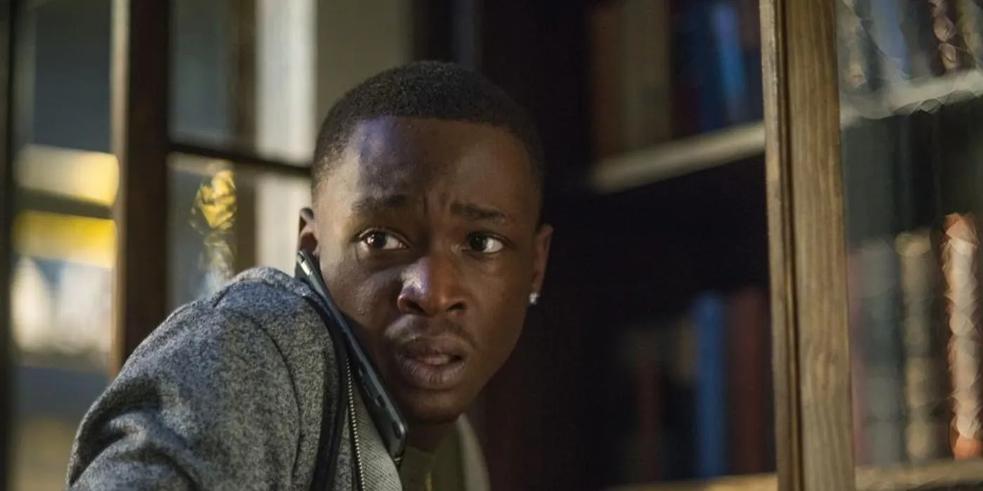 Ashton Sanders au téléphone dans Equalizer 2