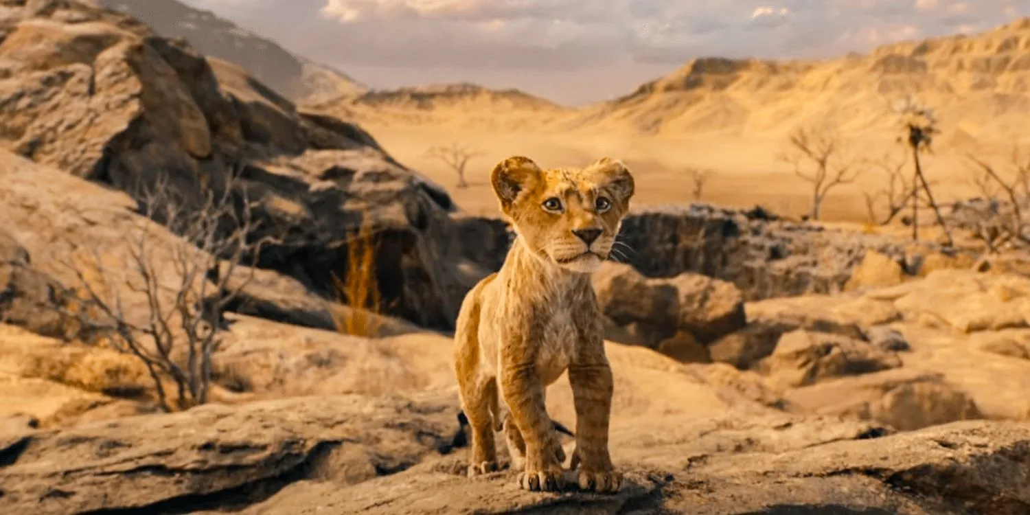 Young Mufasa in the middle of the savanna in Mufasa: The Lion King