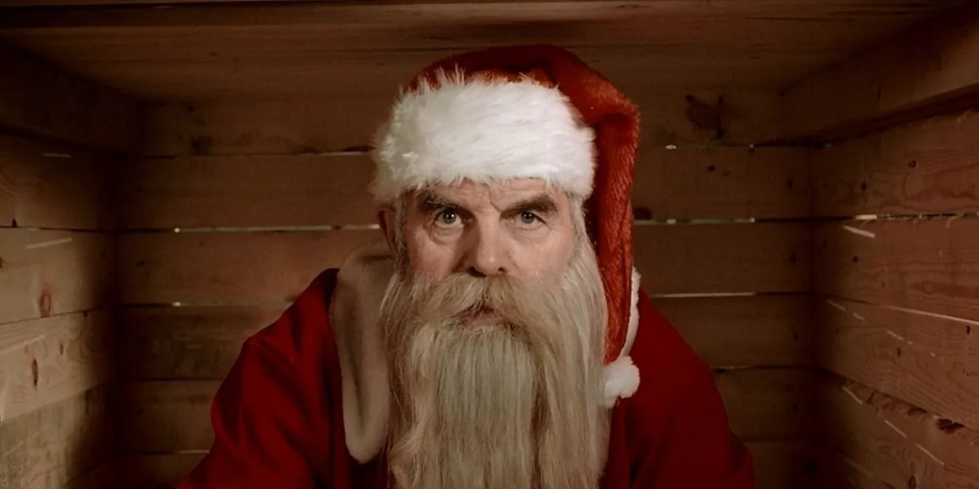 Santa Claus sitting in a wooden box in Rare Exports: A Christmas Tale.