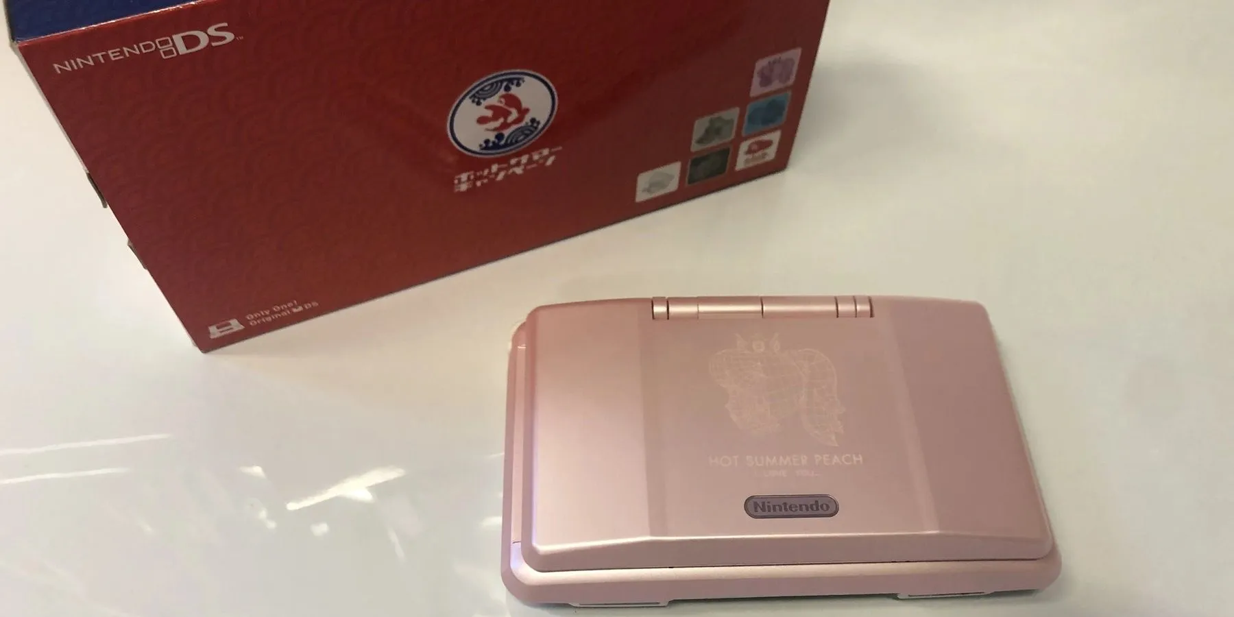 Console di gioco rare - Hot Summer Peach DS