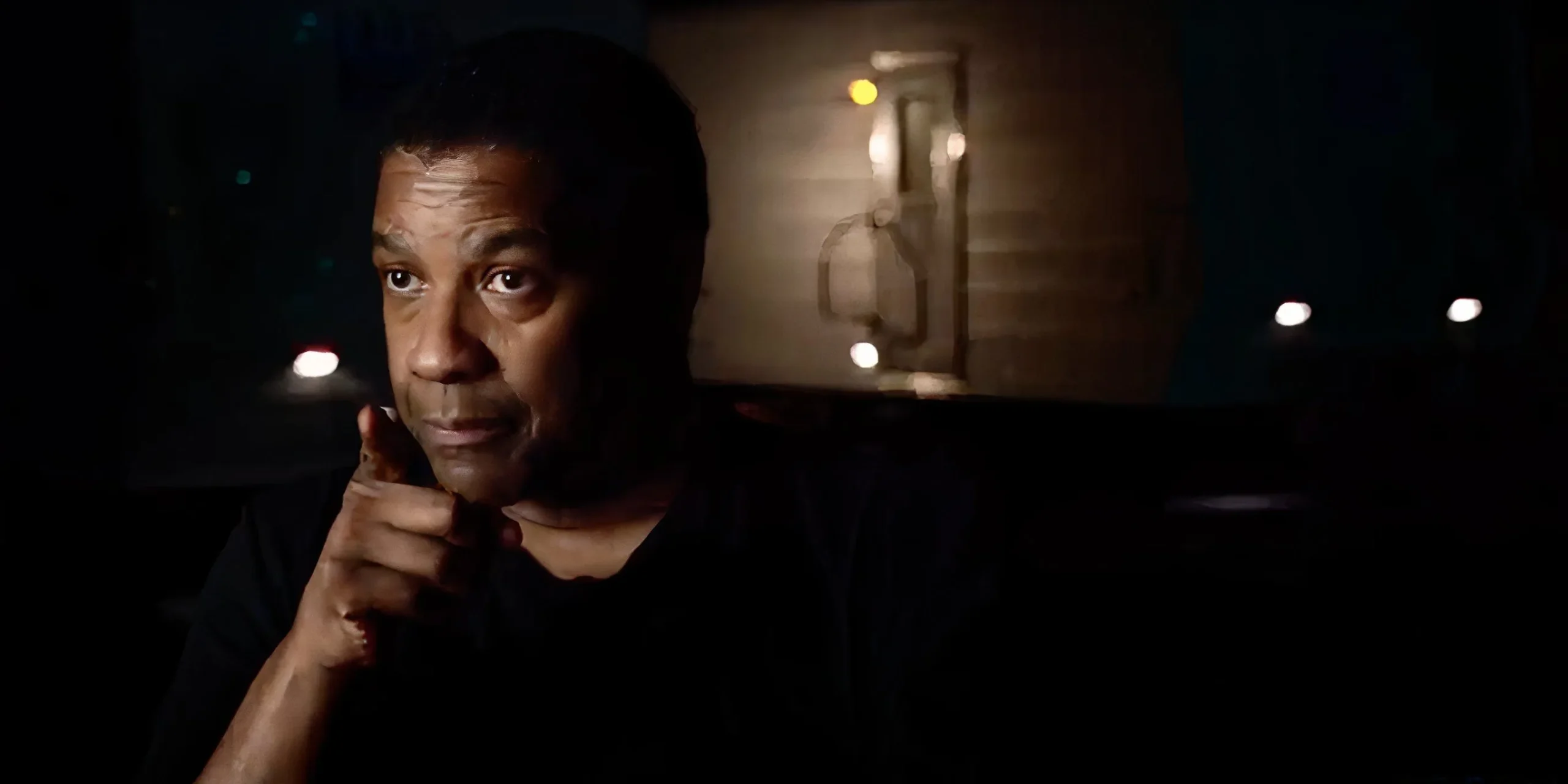 Denzel Washington pointing to the screen in Giving Voice