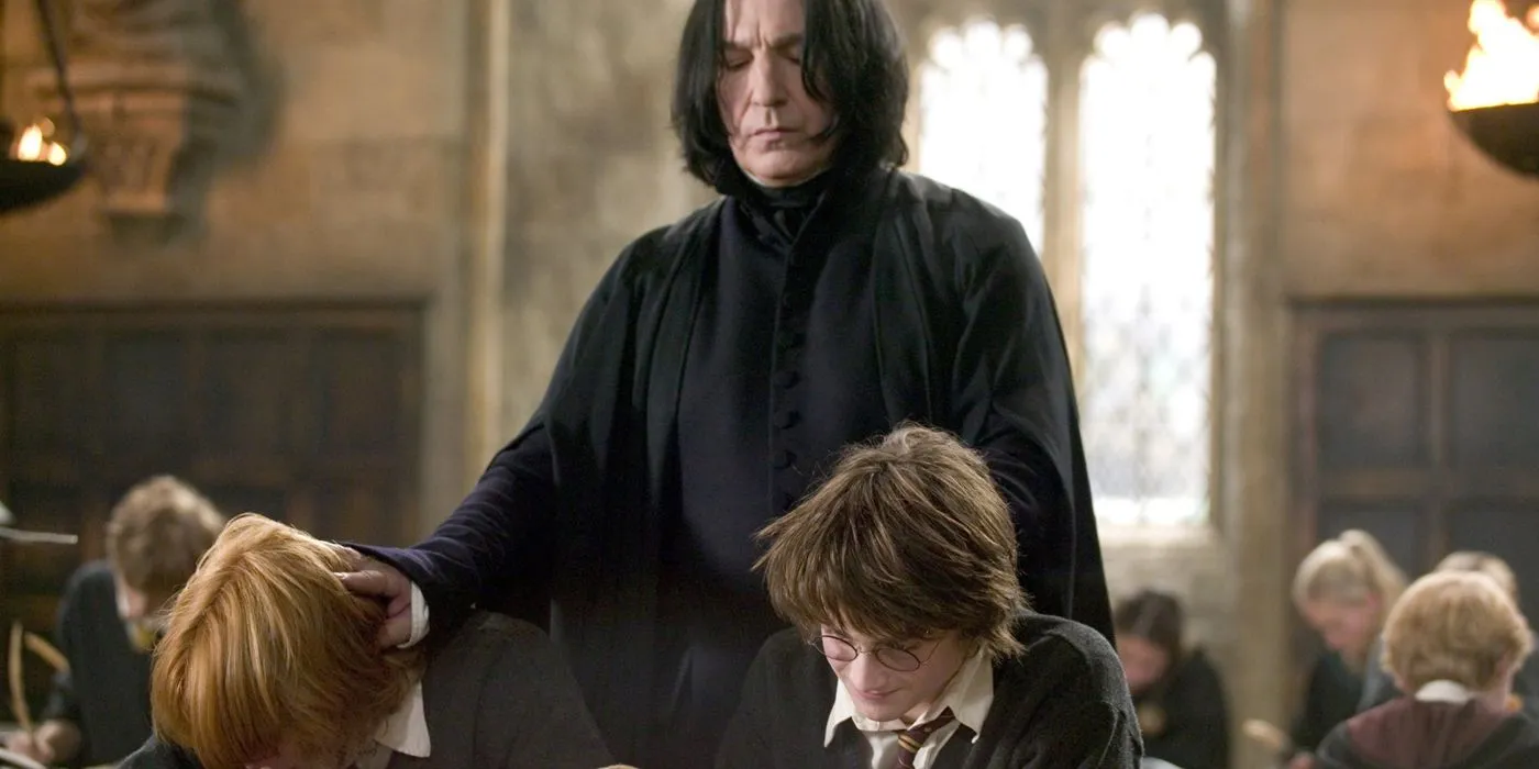 Severus Snape behind Harry Potter and Ron.