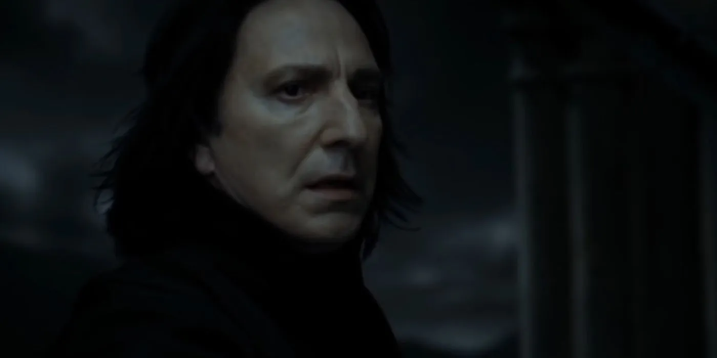 Severus Snape looking at Harry Potter.