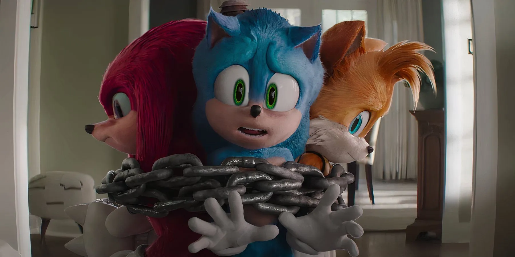 Sonic, Tails, and Knuckles chained together