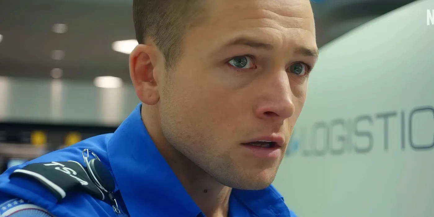 Taron Egerton looking nervous in Carry-On