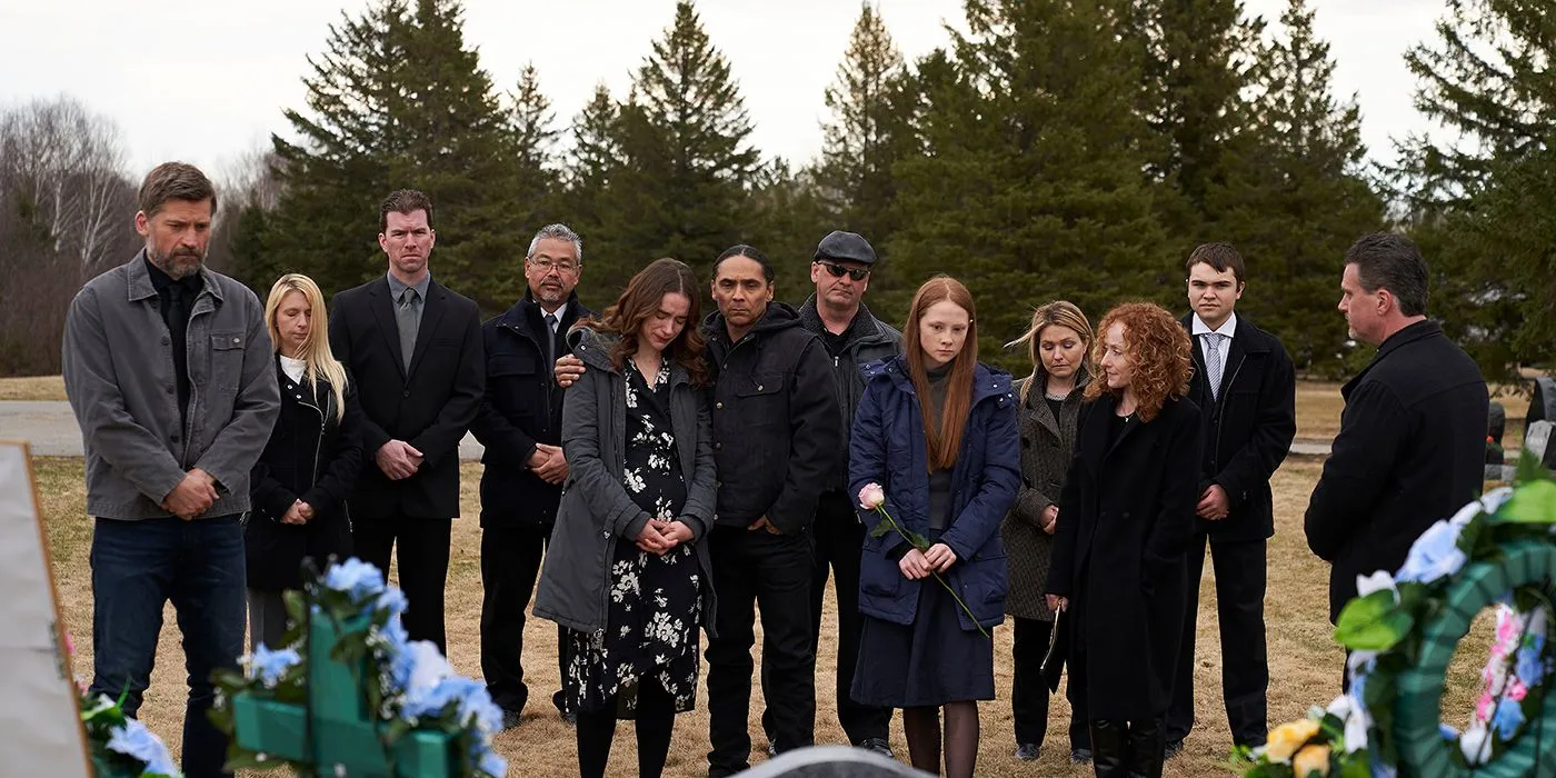 Family and friends gathered around Gwen's grave in The Silencing.