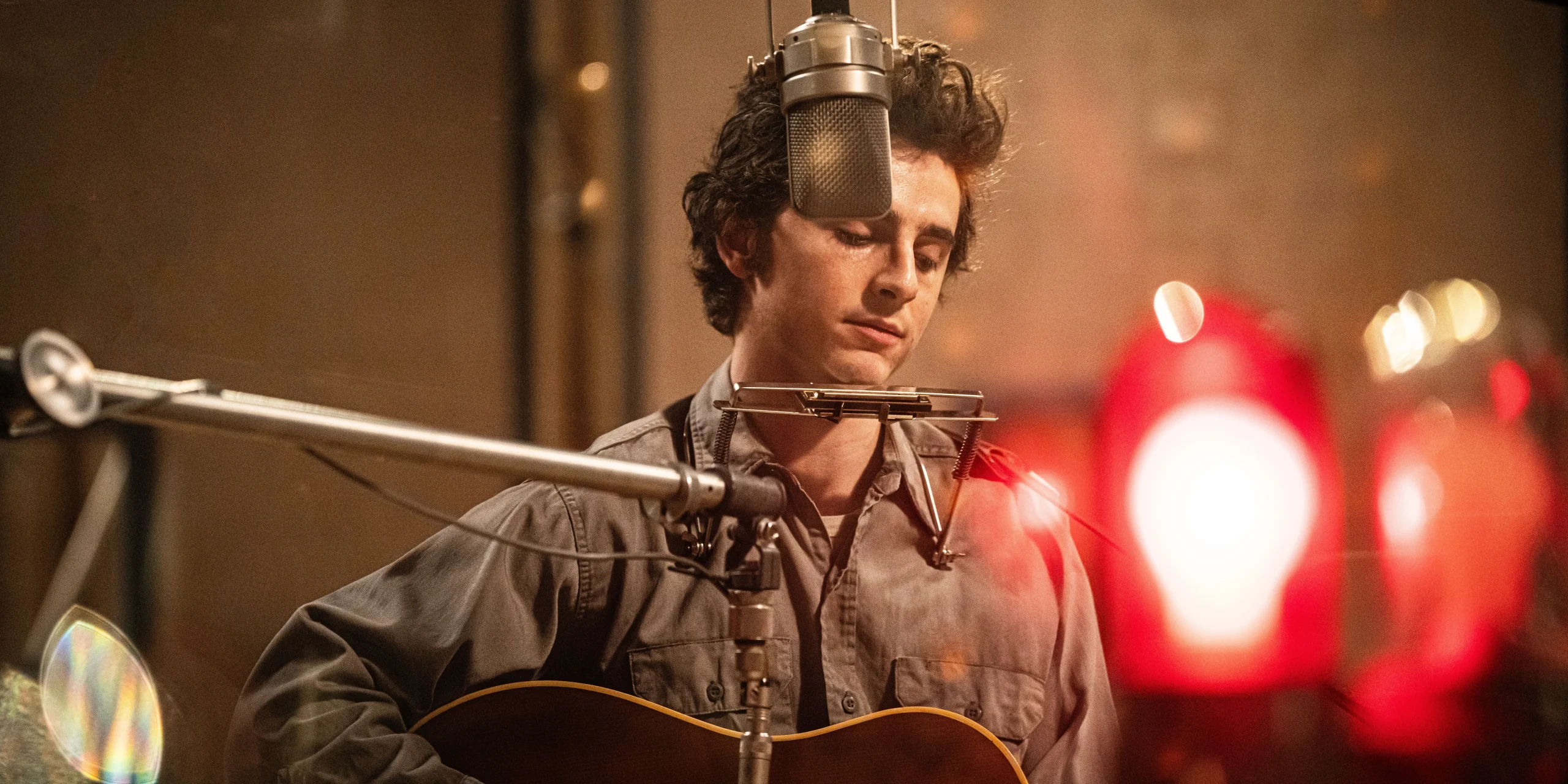 Timothée Chalamet as Bob Dylan recording music